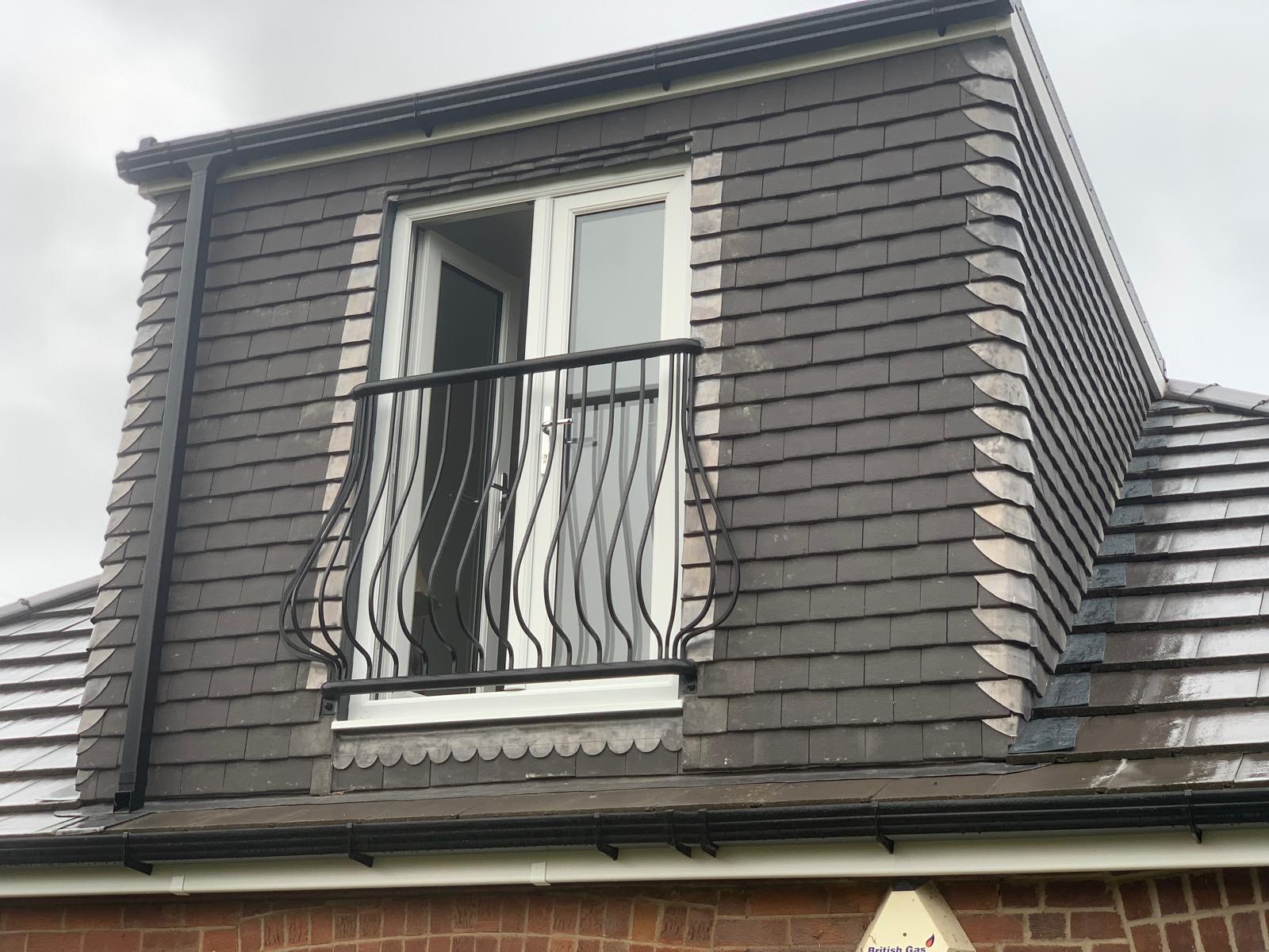 Slate-hung dormer with Juliet balcony